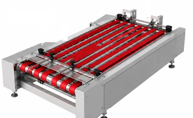 Red high-grip feeder belts on a feeding section